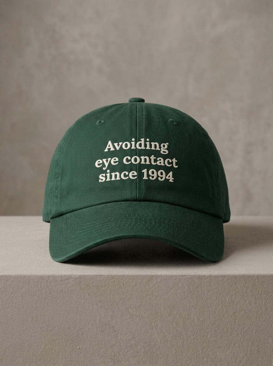 Avoiding eye contact since 1994 / Dad Hat