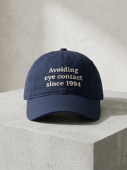 Avoiding eye contact since 1994 / Dad Hat