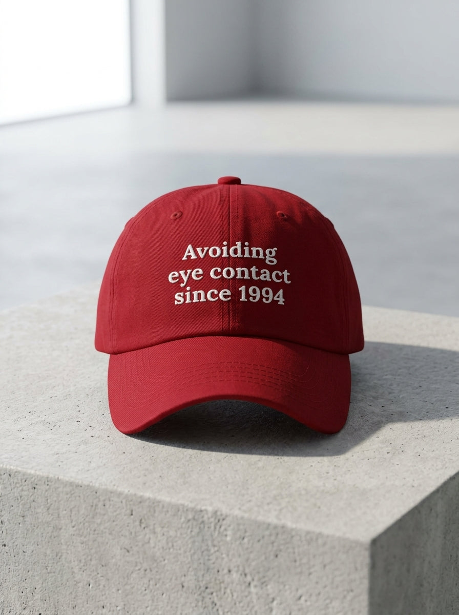 Avoiding eye contact since 1994 / Dad Hat