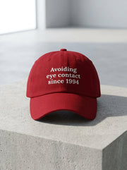 Avoiding eye contact since 1994 / Dad Hat
