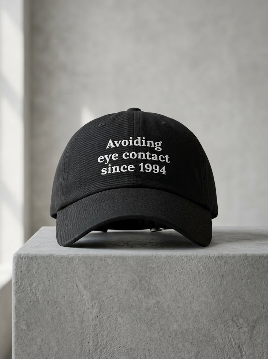Avoiding eye contact since 1994 / Dad Hat